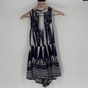 Rumor Boutique ladder front Navy and White Patterned Romper small